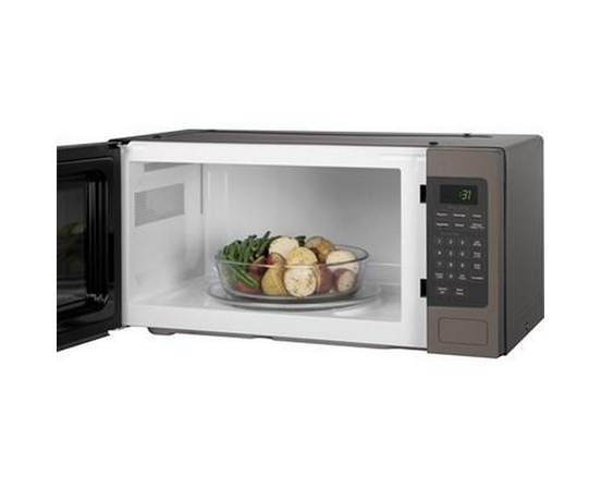 Four à micro-ondes de comptoir de 24 po, 1,1 Pi cu. avec 10 niveaux de puissance GE Profile - PEM10SLFC